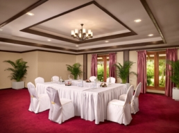Boardroom meeting setup at Villa Nautica with conference seating and natural light