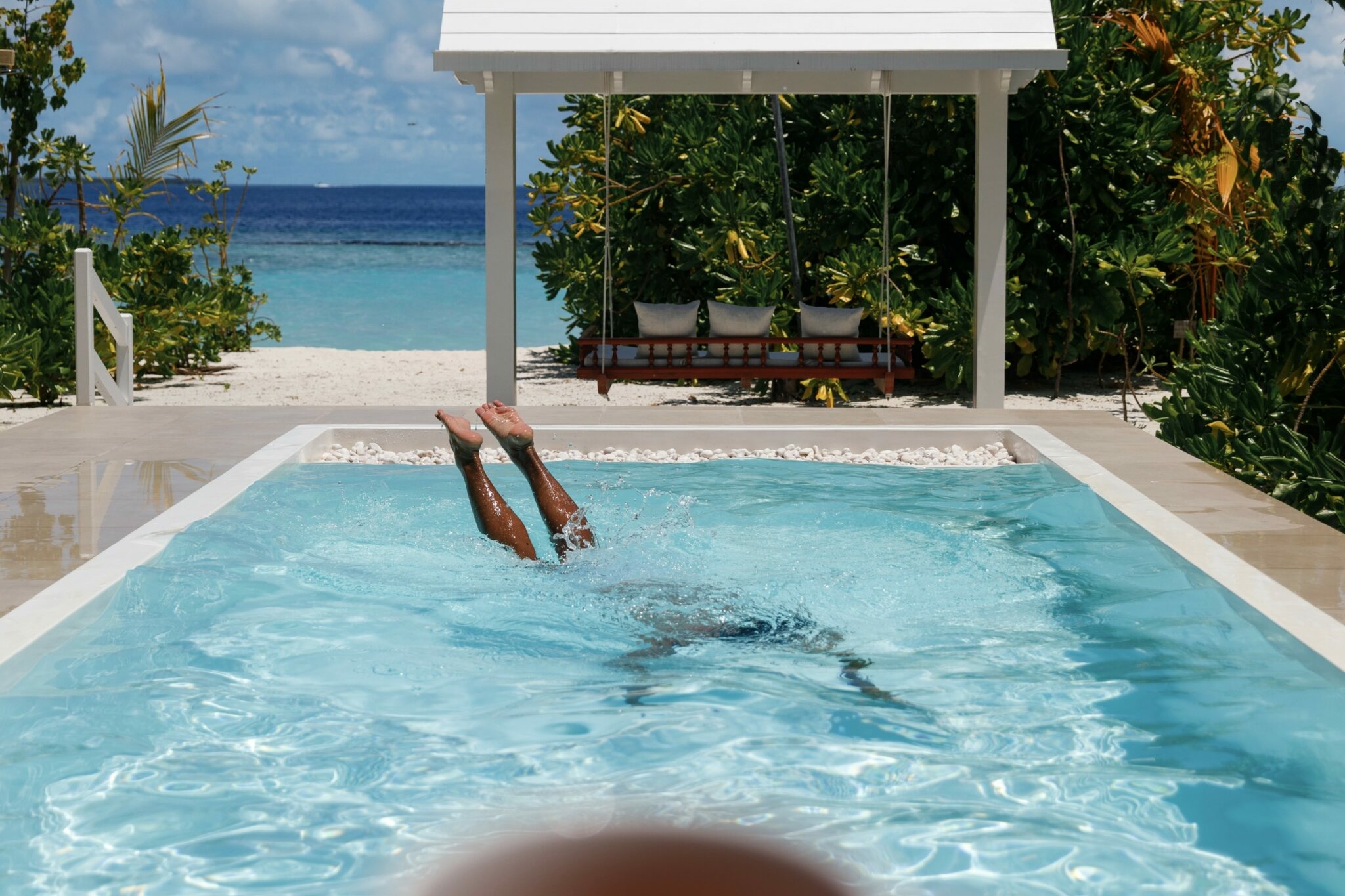 Floating breakfast served beside a private pool at Royal Island in the Maldives