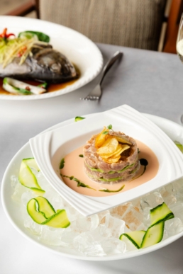 Chilled seafood starter at Hook restaurant, Villa Nautica Maldives, served over ice with cucumber ribbons and crisp garnish