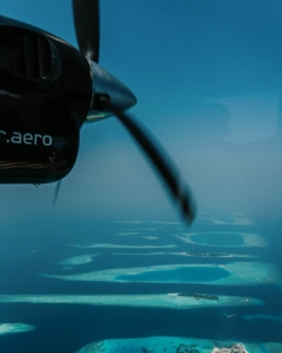 Clear blue Maldivian sky seen during a Villa Air Maldives seaplane journey to Villa Park